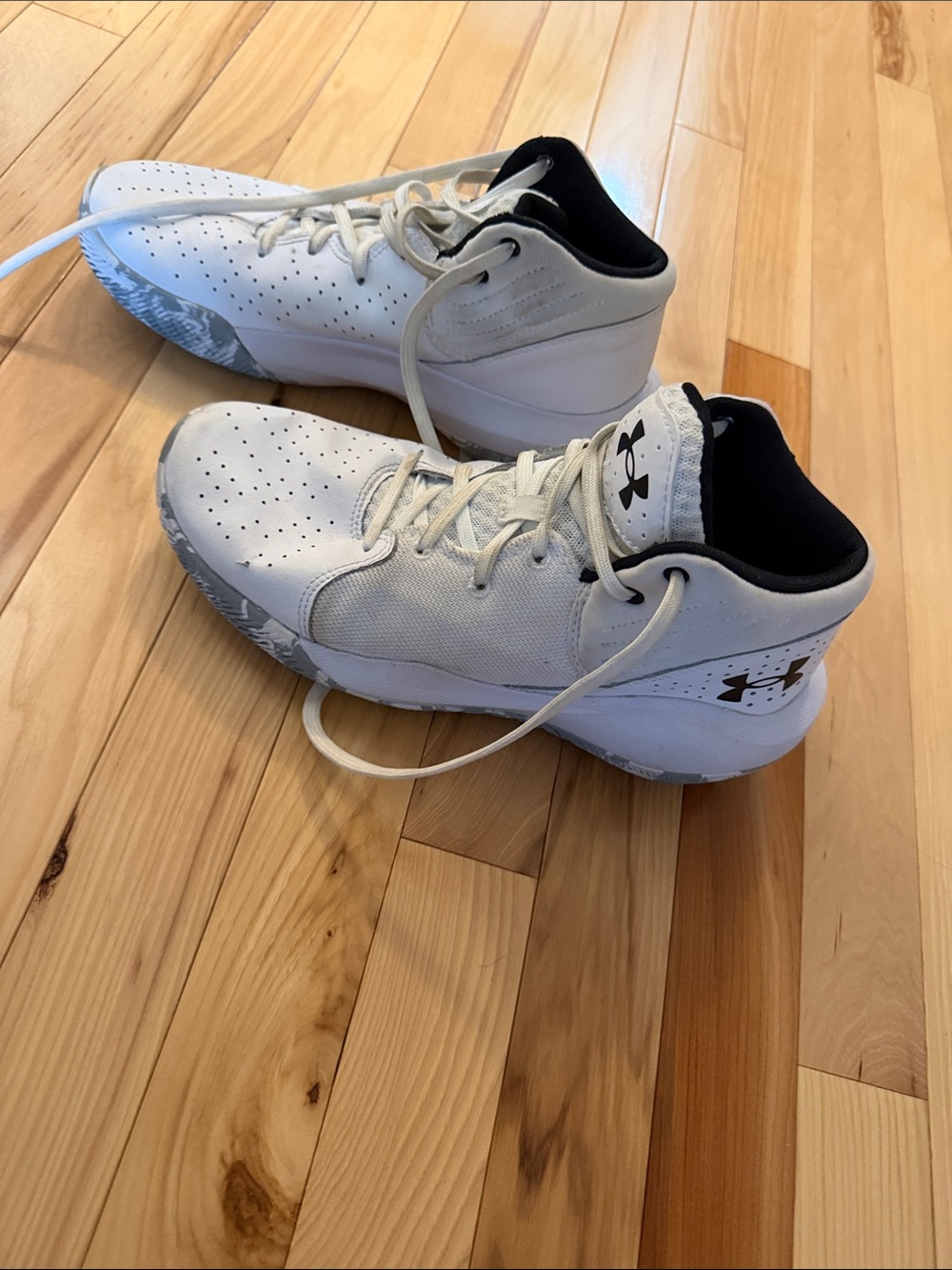 Under Armour White and Black womens basketball shoes
